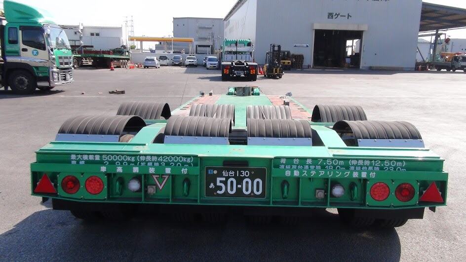 伸縮舵切り50t低床トレーラー | 東北急送 株式会社